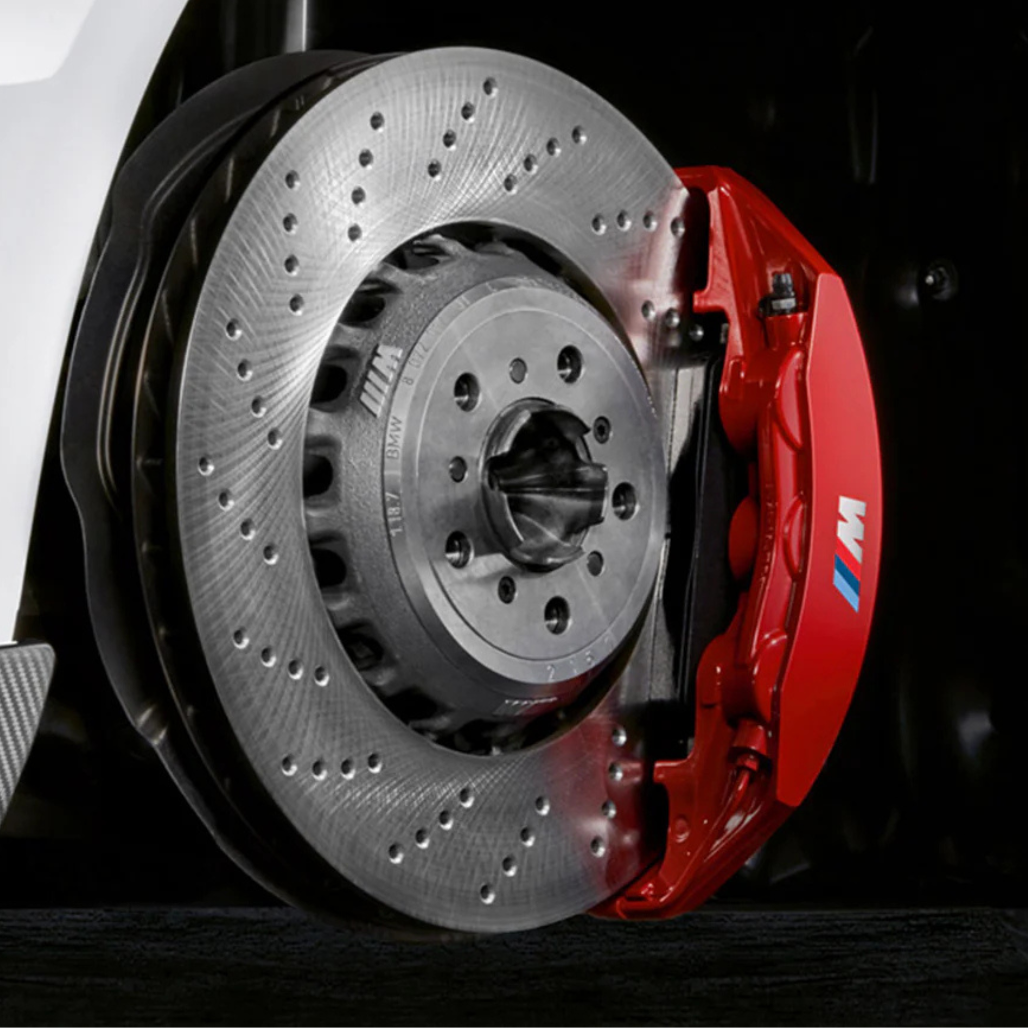 Dark blue BMW 3-Series parked at a modern home in Los Angeles during a Bimmer Tech mobile maintenance visit – professional BMW inspection and care