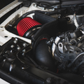 Red performance air intake installed in BMW B46 B48 B58 engine bay - intake installation service at Bimmer Tech in Los Angeles and Orange County